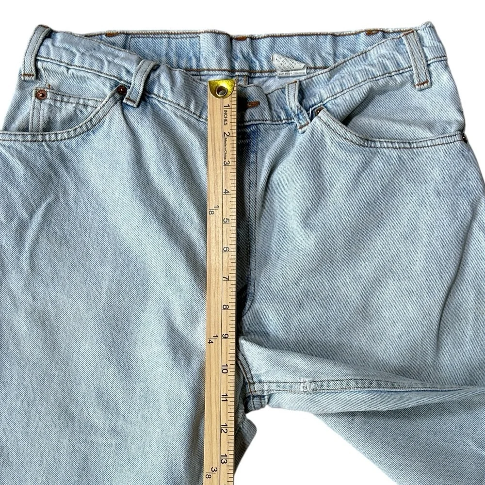 Vintage Orange Tab Levi’s 550 Light Wash Relaxed Baggy Jeans Made in USA, 33